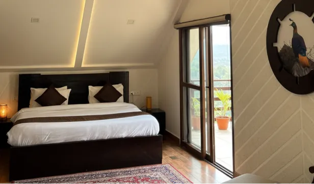 Spacious hall with natural light pouring through French windows