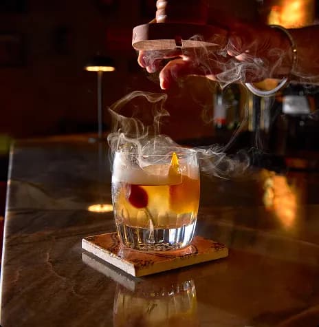 Exterior view of the homestay illuminated at dusk